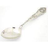 An American silver souvenir spoon titled 'Oklahoma ' titled to handle with ' Great Seal of the
