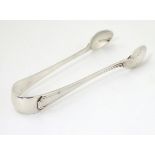 Silver sugar tongs Sheffield 1922 maker P Ashberry & Sons.