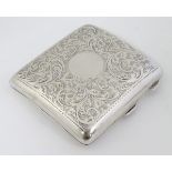 A silver cigarette case. Hallmarked Birmingham 1918 maker William Neale & Son Ltd.