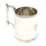 A silver Christening mug with ornate handle hallmarked Birmingham 1908 maker Jones & Crompton 3