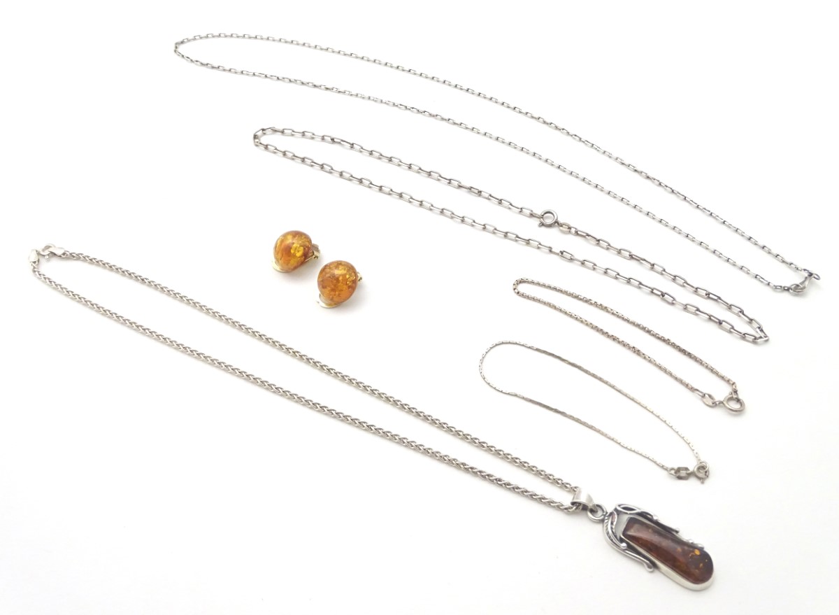 Assorted jewellery including a pair of silver gilt clip earrings set with amber cabochon,