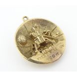 Space race / Moon landing: A 9ct gold pendant of circular form commemorating 'First man on moon' 20.