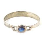 A silver bracelet set with blue stone cabochon CONDITION: Please Note - we do not