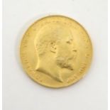 Coin: a 1909 sovereign,