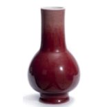 Vase boule à long col en porcelaine de Chine à couverte sang de bœuf H.20.5x10 cm [...]