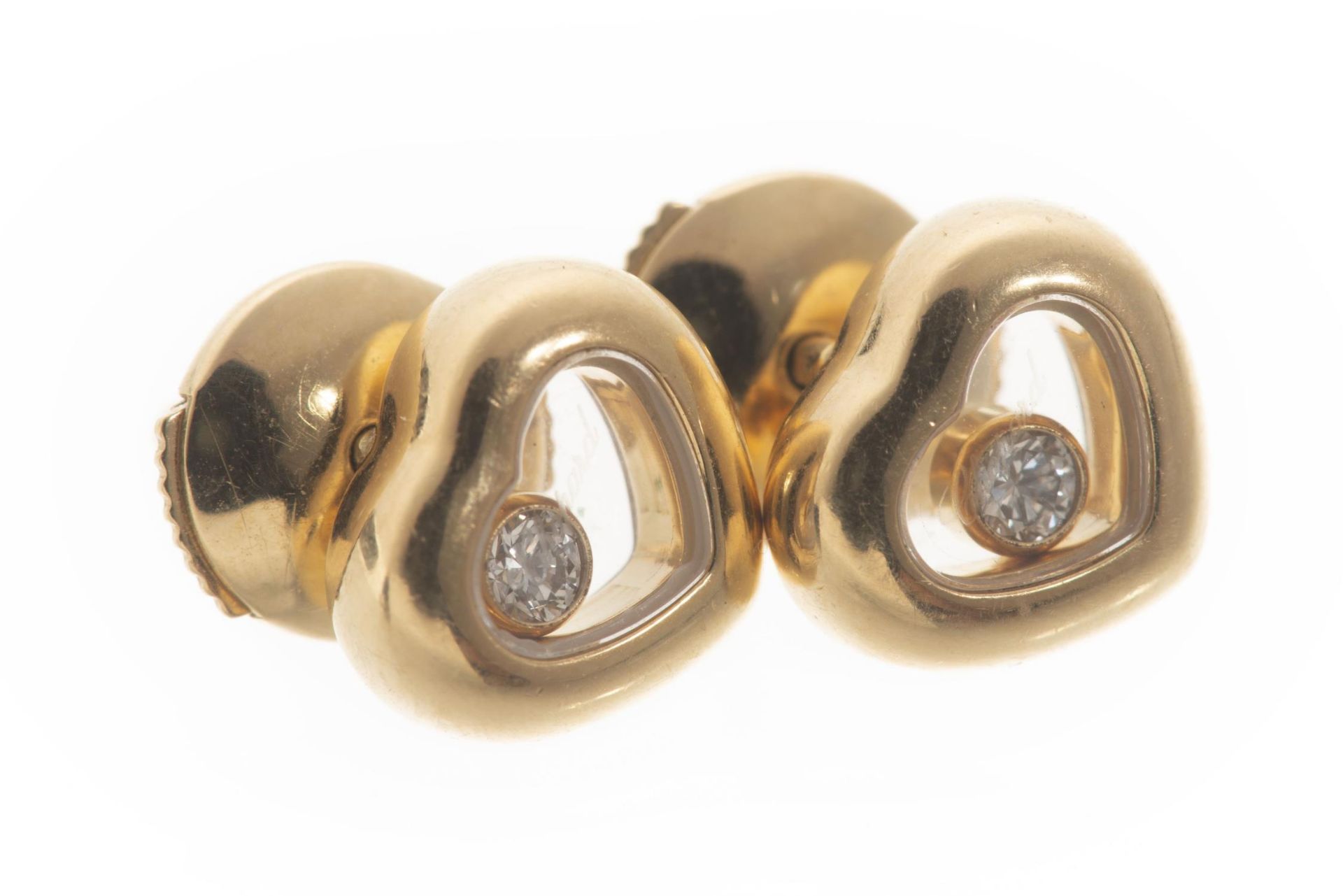 Chopard, boucles d'oreilles Happy Diamonds en or jaune .750 en forme de cœur