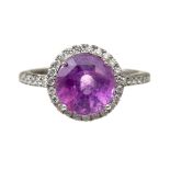 Bague en or gris .750 surmonté d'un saphir saphir rose de 4.48 cts et diamants