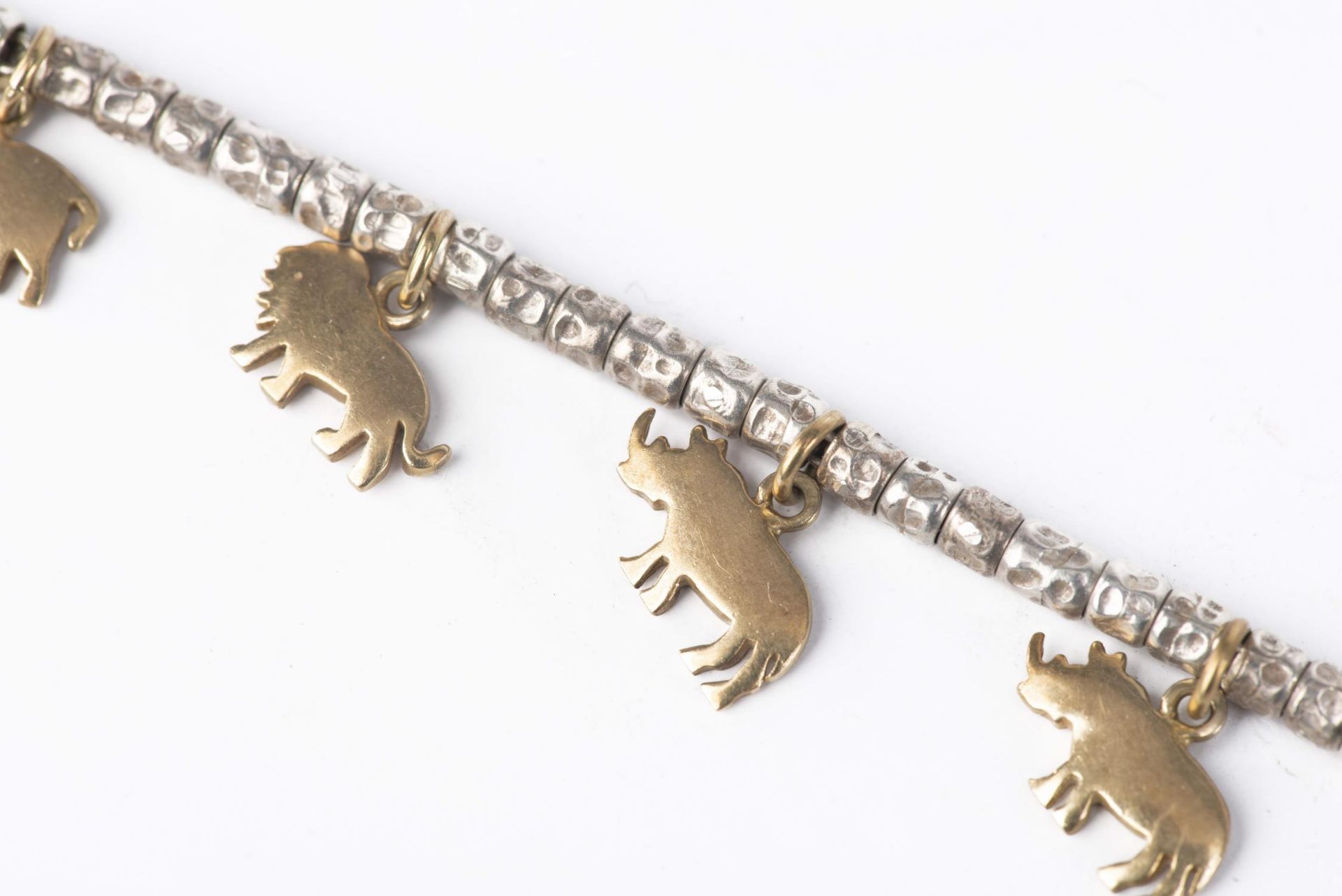 Pomellato, bracelet à breloques en forme d'animaux de la savane en argent et or [...] - Bild 3 aus 5