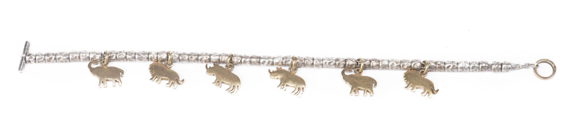 Pomellato, bracelet à breloques en forme d'animaux de la savane en argent et or [...]