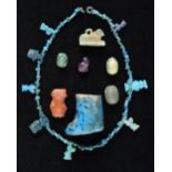 *Ancient Egypt. A small collection of Egyptian antiquities, including and faience necklace and