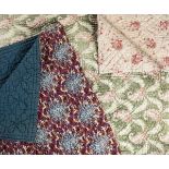 *Quilt. A Welsh quilt, circa 1930s, reversible quilt of printed cotton with pink boteh motif on a