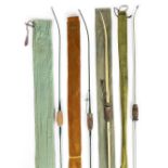 *Archery. 12 1950s steel bows, comprising two part green bow, 170cm long, Accles & Pollock Ltd