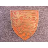 *Shield. A 19th century bronze heraldic shield, cast with three lions on red painted ground, with