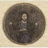 *Embroidery. An ecclesiastical roundel, early-mid 18th century, depicting a three-quarter length