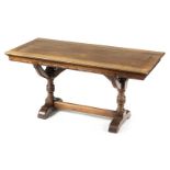 *Library Table. Victorian mahogany Gothic revival library table, the rectangular top above curved