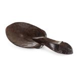 *Indonesian Spoon. A 20th century Dyak ritual spoon, carved as a turtle, the bowl formed as its