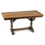 *Library Table. Victorian mahogany Gothic revival library table, the rectangular top above curved