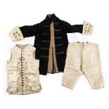 *Infant's clothing. A set of garments for a small boy, probably late 18th century (with later