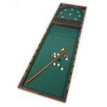 *Bar Billiards. Edwardian mahogany folding bar billiards, with cue, balls and accessories, 241.5cm