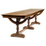 *Table. A large Victorian Gothic revival mahogany refectory table, the rectangular top above three