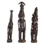 *New Guinea. Three Sepik River carved wood figures, including a mythical figure with crocodile and