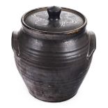 *Leach (Michael, 1913-1985). Yelland Pottery ovoid marmite jar and cover, with a dark brown glaze,