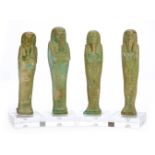 *Ancient Egypt. 26th Dynasty, green faience Shabti of Ankh-her, the mummiform figure modelled