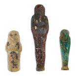 *Ancient Egypt. Ptolemaic, dark red Shabti, the mummiform figure modelled wearing tripartite wig,