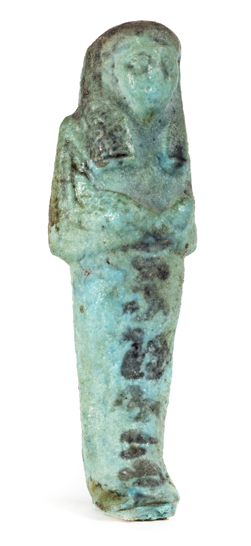 *Ancient Egypt. 19th Dynasty, light turquoise faience mummiform worker Shabti of Ta-hen-Djehouty (