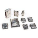 *Vesta Cases. A modern silver vesta case in the Edwardian style, decorated with a golfing design,