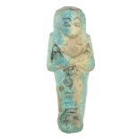 *Ancient Egypt. 22nd Dynasty, pale blue faience Shabti of Nes-Khonsu, the mummiform figure