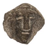 *Stone Head. Medieval stone corbel head, carved as young man with characterful face wearing a