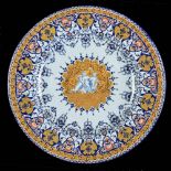 *Charger. A late 19th century Continental pottery charger, decorated on the Italianate style with