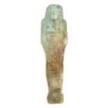 *Ancient Egypt. 30th Dynasty, blue faience Shabti, the mummiform figure modelled wearing