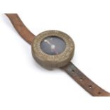 * U.S.A.A.F. A WWII US Army / Air Force magnetic wrist compass, the dry type compass stamped on ...