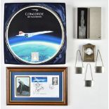 * Concorde. A collection of Concorde memorabilia, including a small timepiece by R Carr, present ...