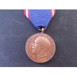 * Royal Victorian Medal, G.V.R., bronze issue, one spot of Verdigris on the edge, very fine and ...