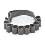 * Luftwaffe. A WWII flare cartridge bandolier, grey cloth with holders for 10 cartridges, 67cm l ...