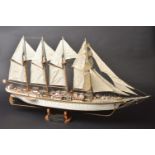 * Model Ship. Wooden scale model ship of 'Juan Sebastian Elcano', with four fully rigged sails, ...