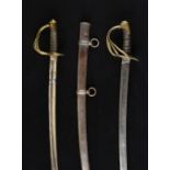 * American Swords. An American Model 1860 Cavalry Trooper’s Sword, the 90.5cm curved steel blade ...