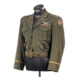 * United States Army Air Force. A USAAF Officer's Ike blouse, worn by a Bombardier, wings badge ...
