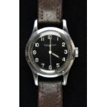 * Military Wristwatch. A WWII Jaeger Le Coutre military wristwatch, the 28mm circular black dial ...