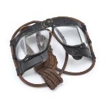 * WWII RAF. A rare pair of WWII RAF Mk IV flying goggles, with black metal frame, split glass le ...