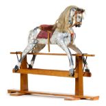 Rocking Horse. An English dapple grey rocking horse by J. Collinson and Sons, circa 1950s