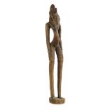 * Senufo. An early 20th century Senufo tribe carved wood figure