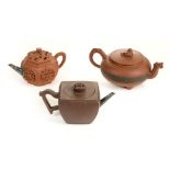 * Teapots. A late 19th century Chinese Yixing terracotta teapot