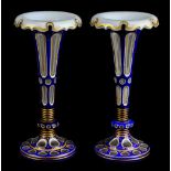 * Vases. A fine pair of late 19th century Bohemian overlay glass vases