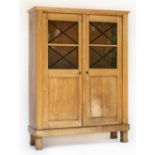 * Display Cabinet. A 19th century German Biedermeier light mahogany display cabinet