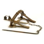 * Mantrap. A Victorian iron mantrap