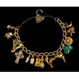 * Bracelet. A 9ct gold hollow link charm bracelet